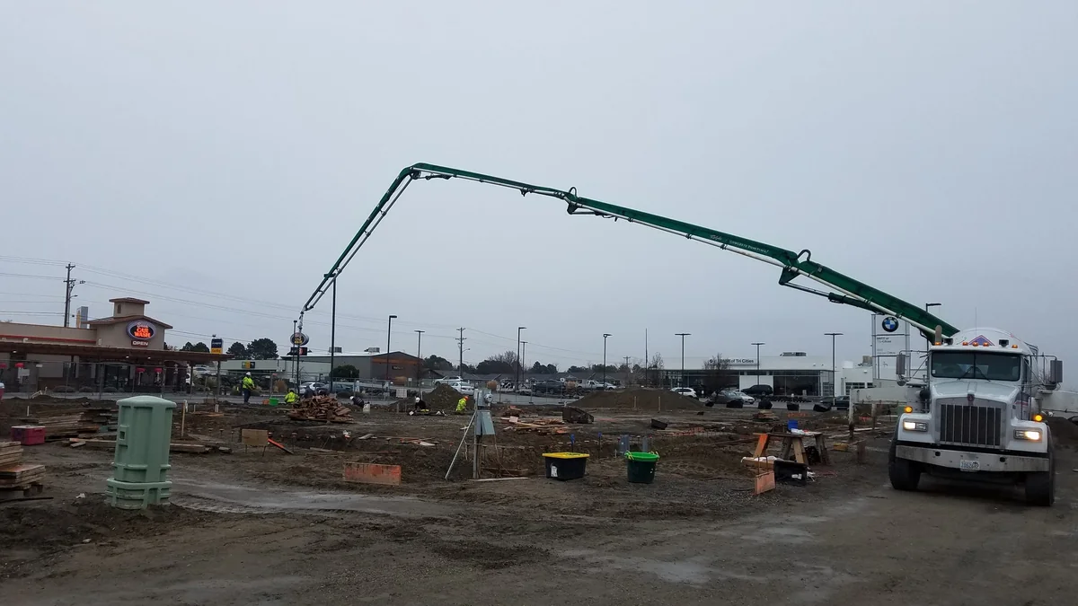 The Auto Lot entrance elevation and accessible parking
